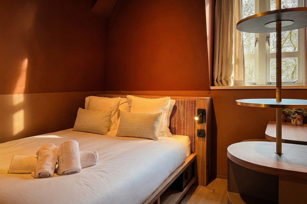 Small double room bed and window